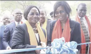  ??  ?? Honourable Lady Justice Elizabeth Muyovwe and Senior Resident Magistrate Honourable Idah Phiri cut the ribbon during the official opening of Gender Based Violence (GBV) fast track court in Choma yesterday.