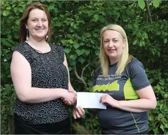  ??  ?? Grace Shevlin, Nadd, (right), presenting a cheque to Helen O’ Driscoll (co-ordinator Cancer Connect), proceeds from the Great Limerick Run which Grace took part in recently. Photo: Sheila Fitzgerald