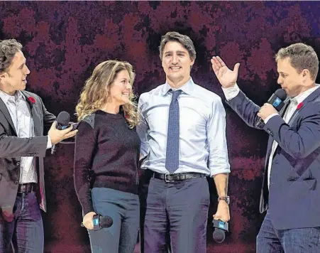  ?? POSTMEDIA ?? Co-founders Craig, left, and Marc Kielburger introduce Prime Minister Justin Trudeau and his wife Sophie Gregoire-Trudeau at a WE Charity event in Ottawa in 2015.