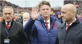  ??  ?? STOKE ON TRENT: Manchester United’s Dutch manager Louis van Gaal (C) waves as he leaves after the English Premier League football match between Stoke City and Manchester United at the Britannia Stadium in Stoke-on-Trent, central England on Saturday. —...