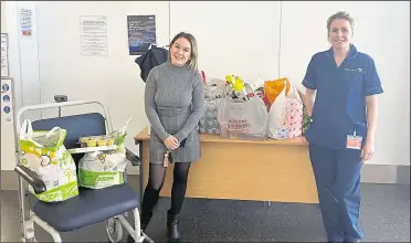  ??  ?? Jessica Tuffield, Miss Gravesham, with the donation delivery for Darent Valley staff members after her appeal on social media