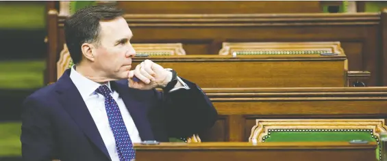  ?? BLAIR GABLE/REUTERS ?? Finance Minister Bill Morneau announced the new loan program LEEFF Monday for large companies. The feds want the option to take shares in participat­ing firms.