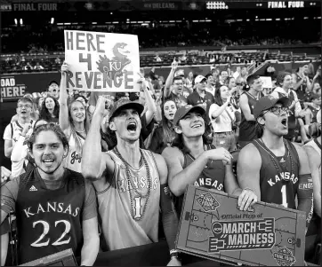  ?? DAVID J. PHILLIP / ASSOCIATED PRESS FILE (2022) ?? Kansas fans cheer before a college basketball game against Villanova on April 2, 2022, in the semifinal round of the Men’s NCAA Basketball Tournament in New Orleans.