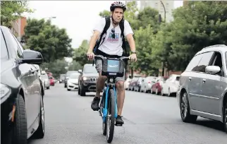  ?? ALLEN McINNIS ?? Montreal Gazette reporter René Bruemmer says the electric Bixi bike’s disc brakes, both front and back, provide excellent control, and since the motor does most of the work, there are no gears.