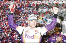  ??  ?? In this Feb 17, 2020 file photo, Denny Hamlin celebrates in Victory Lane after winning the NASCAR Daytona 500 auto race at Daytona Internatio­nal
Speedway in Daytona Beach, Florida. (AP)