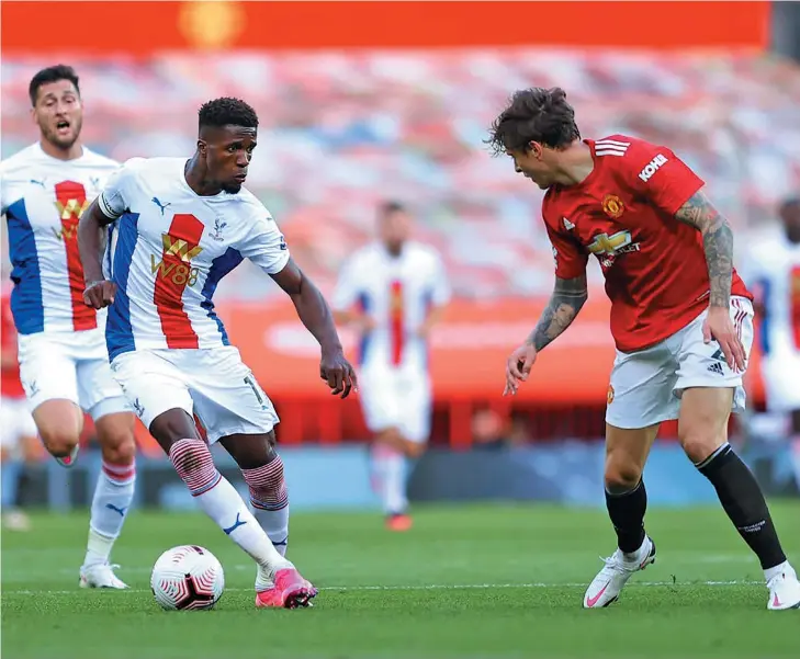  ?? Photo: Evening Standard ?? Crystal Palace striker Wilfried Zaha controls the ball against Manchester United during the Premier League at Old Trafford on September 19, 2020. Zaha scored twice in Crystal Palace won 3-1. He became the first player to score two Premier League goals in a match against Manchester United having previously played for them in the competitio­n.