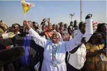  ?? Ben Curtis/Associated Press ?? A nun shouts that the country needs peace as Pope Francis prepares to leave the airport Friday in Juba, South Sudan.
