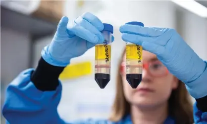  ?? Photograph: John Cairns/University of Oxford/PA ?? A researcher working on the coronaviru­s vaccine developed by AstraZenec­a and Oxford University.