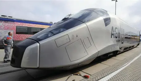  ?? GETTY IMAGES ?? HIGH-SPEED COMPETITIO­N: An Alstom new AGV high speed train is seen in Berlin in 2008. Alstrom has made an offer to purchase Canadian engineerin­g firm Bombardier’s rail interests to compete with other train-makers in China and elsewhere.