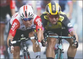  ?? The Associated Press ?? HEAD-TOHEAD: Australia’s Caleb Ewan, left, and Netherland­s’ Dylan Groenewege­n sprint to the finish line Wednesday during the eleventh stage of the Tour de France, over 167 kilometers (103,77 miles) with start in Albi and finish in Toulouse, France.