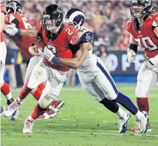  ?? SEAN M. HAFFEY/GETTY IMAGES ?? The Dolphins acquired defensive end Robert Quinn from the Los Angeles Rams for a fourth and sixth-round draft pick. The trade will become official on March 14.