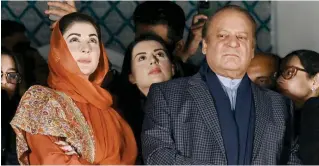  ?? AFP PHOTO ?? STANDING STILL
Pakistan’s former prime minister Nawaz Sharif (right) and his daughter Maryam Nawaz (left) attend a gathering with supporters in the eastern city of Lahore on Friday, Feb. 9, 2024, a day after the country’s national elections.
