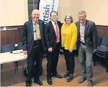  ??  ?? Candidate Mark McGeever, second left, with councillor­s Brown, Dryburgh and Lib Dem boss Willie Rennie