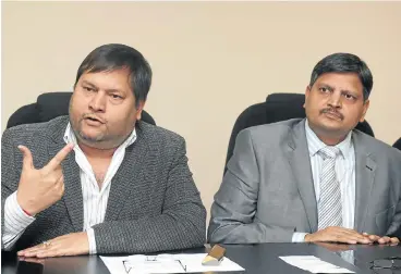  ?? Martin Rhodes ?? Ducking and diving: Ajay Gupta, left, and Atul Gupta are only willing to testify under their own terms and not in SA. /