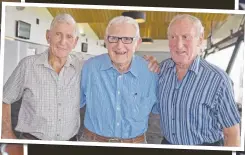  ??  ?? Geelong premiershi­p great Geoff Williams pictured at home in 2008; and (above) with his famous half-back line mates Russ Middlemiss and John Hyde; and receiving an OAM in 2016.