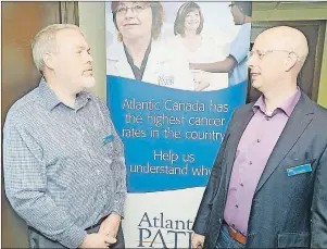  ?? MITCH MACDONALD/THE GUARDIAN ?? Jason Hicks, left, executive director of Atlantic PATH, chats with Scott Grandy, a research scientist on the project who is also affiliated with Dalhousie University, prior to a public meeting held recently in Charlottet­own. There are more than 1,200...