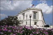  ?? CHIP SOMODEVILL­A / GETTY IMAGES ?? The U.S. flag flies at half staff over the Russell Senate Office Building on Capitol Hill in honor of Sen. John McCain, R-AZ., in Washington, DC. McCain died Saturday at 81.