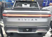  ?? PHOTO BY GENE BLEVINS ?? Rivian R1T was the first all-electric truck and SUV that can get up to 400 miles on a charge
