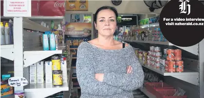  ?? Picture / Nick Reed ?? Janine Burrow says she can’t afford to close her dairy in Mt Roskill.