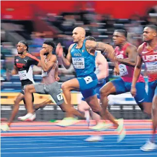  ?? ?? Marcell Jacobs w finale HMŚ 2022 przebiegł 60 m w czasie 6.41, co daje mu czwartą lokatę w historii tej konkurencj­i (rekord świata Christiana Colemana to 6.34). Rok temu w Łodzi popisał się zaś czasem 6.49.