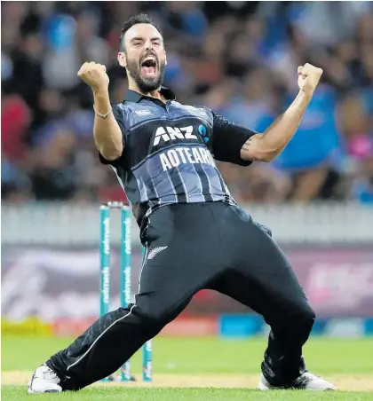  ?? Photo / Getty Images ?? Daryl Mitchell took two wickets at crucial times for New Zealand last night.