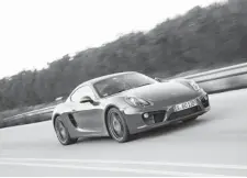  ?? PORSCHE ?? The new Porsche Cayman is a little wider and longer but plenty nimble.