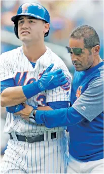  ?? Paul J. Bereswill; Anthony J. Causi ?? ON THE SPOT: Mets trainer Ray Ramirez was on the scene for every big injury this season, including Michael Conforto (above), Yoenis Cespedes (top right) and the bulk of the pitching staff — all of whom missed time in this disappoint­ing season for team...