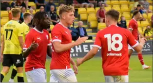  ?? Picture: Barnsley FC. ?? Scorer:
Aiden Marsh, middle, celebrates his goal with Fabio Jalo and Joe Ackroyd.