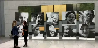  ?? LIA ZHU / CHINA DAILY ?? Historical photos of 12 “comfort women” from several countries are displayed at an exhibition in the California State Building in San Francisco on Wednesday.