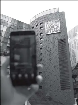  ?? Photo: IC ?? A hotel displays a giant QR code on its side in Shapingba district, Southwest China’s Chongqing on Sunday.