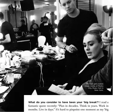  ??  ?? Michael gets Adele stage-ready at Radio City Music Hall inNew York.