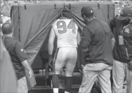  ?? ASSOCIATED PRESS FILE PHOTO ?? Browns defensive end Carl Nassib enters a pop-up medical tent on the sideline during an NFL game against the New York Jets in Cleveland on Oct. 8.