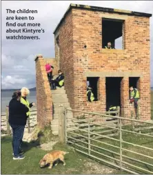  ??  ?? The children are keen to find out more about Kintyre’s watchtower­s.