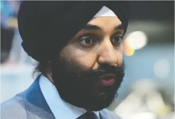  ??  ?? Industry Minister Navdeep Bains is mandated by the government to use “all available instrument­s” to make the 25-per-cent wireless rate reduction a reality within two years. SEAN KILPATRICK/THE CANADIAN PRESS FILES