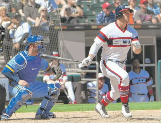  ?? DAVID BANKS/ AP ?? Daniel Palka follows the flight of his two- run home run off Matt Albers in the sixth inning Sunday that gave the Sox a 3- 1 lead against the Milwaukee Brewers.