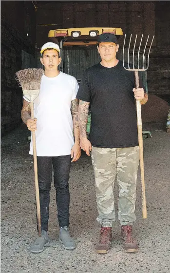  ?? FOOD NETWORK/CORUS ?? Danny Smiles, left, and Chuck Hughes hit the road for their new Food Network series.