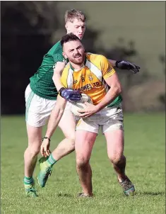  ??  ?? Dunlavin’s Paul Murtagh battles with Avondale’s Oisin McGraynor.