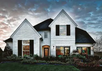  ??  ?? Toll Brothers will showcase a collection of one- and two-story home designs featuring classic exteriors at Venetia Grove, the coming-soon section in The Woodlands.