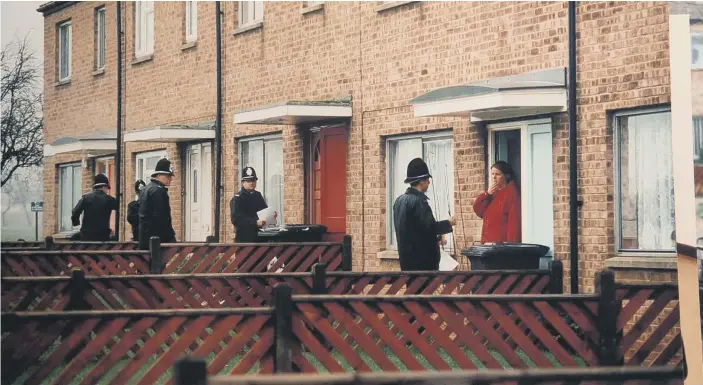  ?? ?? In a massive operation, police carried out door to door inquiries.