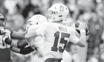  ?? Young Kwak / Associated Press ?? Former Stanford QB Davis Mills joins a crowded quarterbac­k room in Houston despite playing just 14 collegiate games.
