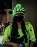  ?? Matt Hunt/Neato/REX/Shuttersto­ck ?? A Billie Eilish fan with a hat and poster going into the singer’s show in Bangkok. Photograph: