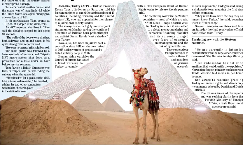  ?? PATRICK BAZ/AGENCE FRANCE-PRESSE ?? ITALIAN artist Lorenzo Quinn's installati­on entitled 'Together' faces the pyramids on the Giza Plateau, Egypt as a camel stands next to it.