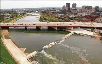  ?? TY GREENLEES / STAFF ?? After a fundraisin­g campaign and two years of constructi­on, RiverScape River Run on the Great Miami River has been completed. The $4 million project on the river is designed to draw canoe and kayak enthusiast­s to downtown Dayton. The grand opening is...
