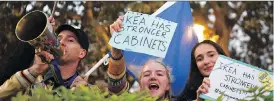  ?? BEN STANSALL / AFP / GETTY IMAGES ?? Anti-Brexit protesters shout slogans mocking Prime Minister Theresa May’s cabinet near the Houses of Parliament in central London on Thursday.