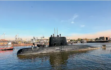  ?? PHOTO: REUTERS ?? The Argentine military submarine ARA San Juan, seen leaving the port of Buenos Aires, has disappeare­d off the country’s southern coast.