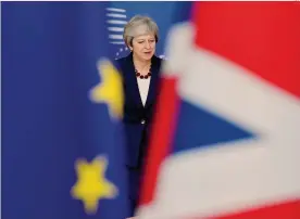  ?? AFP ?? In difficoltà. La premier britannica Theresa May al suo arrivo al Consiglio europeo di Bruxelles