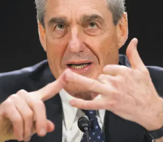  ?? Saul Loeb / AFP / Getty Images 2013 ?? Robert Mueller, then FBI director, testifies in 2013 in Washington, D.C. Mueller is now special counsel overseeing the investigat­ion into Russian interferen­ce in the 2016 presidenti­al election.