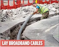  ??  ?? LAY BROADBAND CABLES