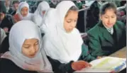  ??  ?? School children attend a class at a school in Srinagar. HT FILE