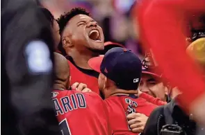  ?? DAVID DERMER/AP ?? The Guardians’ Oscar Gonzalez celebrates following his game-winning home run in the 15th inning on Saturday.